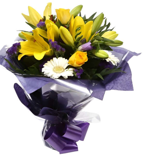 Delightful Flowers BouquetA Delightful Bouquet filled with flowers in Yellow and Purple shades. Including large-headed Roses, Lilies, Carnations, Freesias, a modern yet truly enchanting gift. Beautifully wrapped and tied with ribbon before being delivered