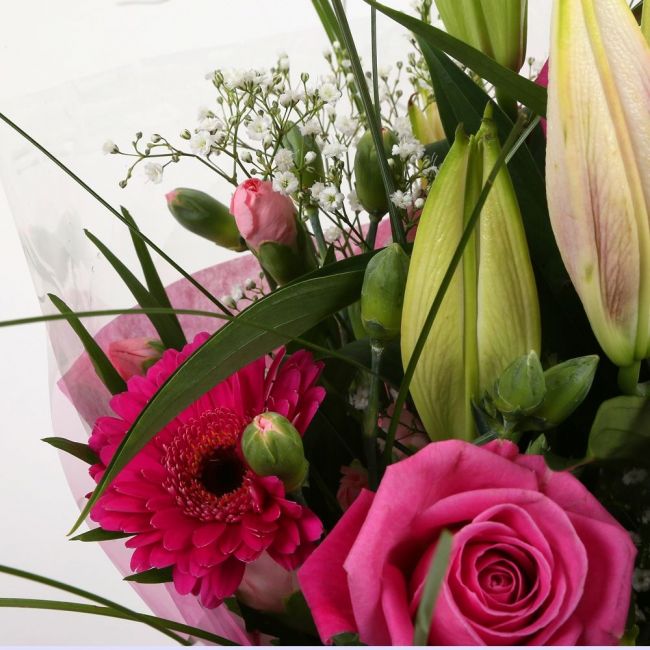 Pink Florence BouquetPink Florence Bouquet, This Lovely Pink Bouquet features matching Pink Roses, Gerberas, Pink Spray Carnations and Pink lillies, Gypsophila, punctuated with palm leaves, expertly created by our florists.£14.99