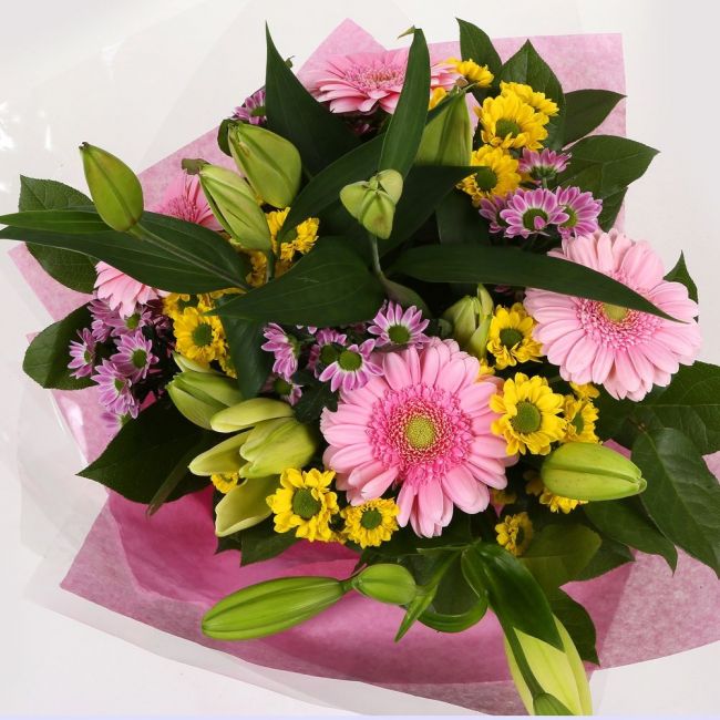 Florist Meadow Flowers BouquetFlorist Meadow Bouquet, this Bouquet contains Pink Germini, White Lillies, Pink & Yellow Santini Chrysanthemums, Beautifully wrapped and tied with ribbon before being delivered.£14.99
