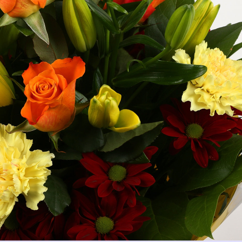 Happy Birthday Balloon & Redsunshine FlowersHappy Birthday Balloon & Beautiful Red Sunshine Orange Bouquet, Roses and Lillies with foliage, wrapped with matching ribbon. Beautifully wrapped and tied with ribbon before being delivered.£19.99