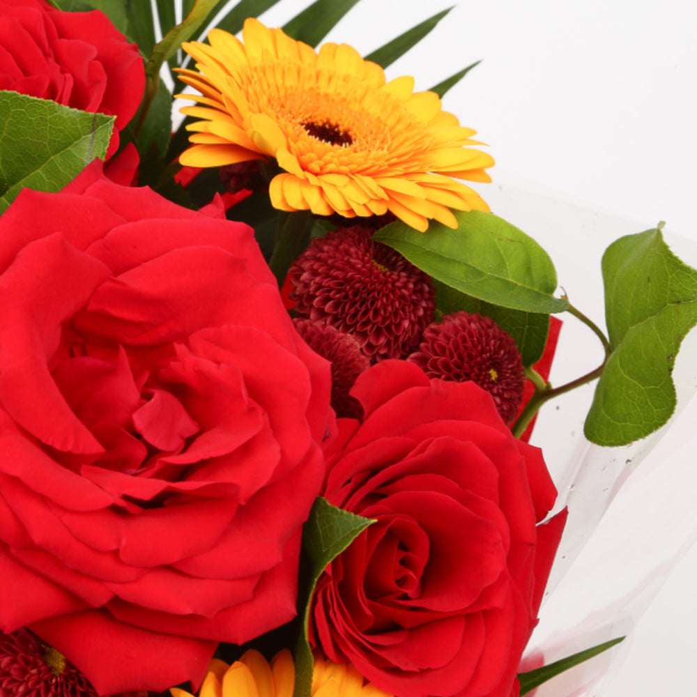 Love You-Balloon & Red Sun BouquetThis Beautiful Bouquet with Balloon, carefully selected flowers with foliage are expertly arranged to create this dramatic design. This stunning gift is the ultimate gift to create an impression. Beautifully wrapped and t