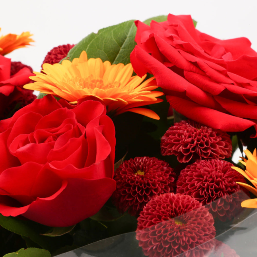 Love You-Balloon & Red Sun BouquetThis Beautiful Bouquet with Balloon, carefully selected flowers with foliage are expertly arranged to create this dramatic design. This stunning gift is the ultimate gift to create an impression. Beautifully wrapped and t