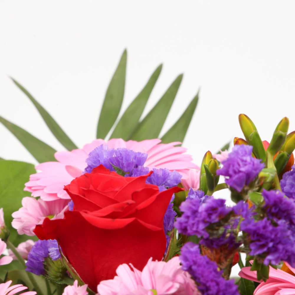 Congratulations Balloon & Red Blush FlowersThis Beautiful Bouquet with Balloon, carefully selected flowers with foliage are expertly arranged to create this dramatic design. This stunning gift is the ultimate gift to create an impression. Beautifully wrap