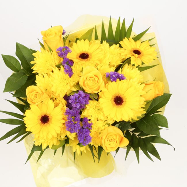 Yellow Star BouquetThis Beautiful Bouquet, carefully selected flowers with foliage are expertly arranged to create this dramatic design. This stunning gift is the ultimate gift to create an impression. Beautifully wrapped and tied with ribbon before being