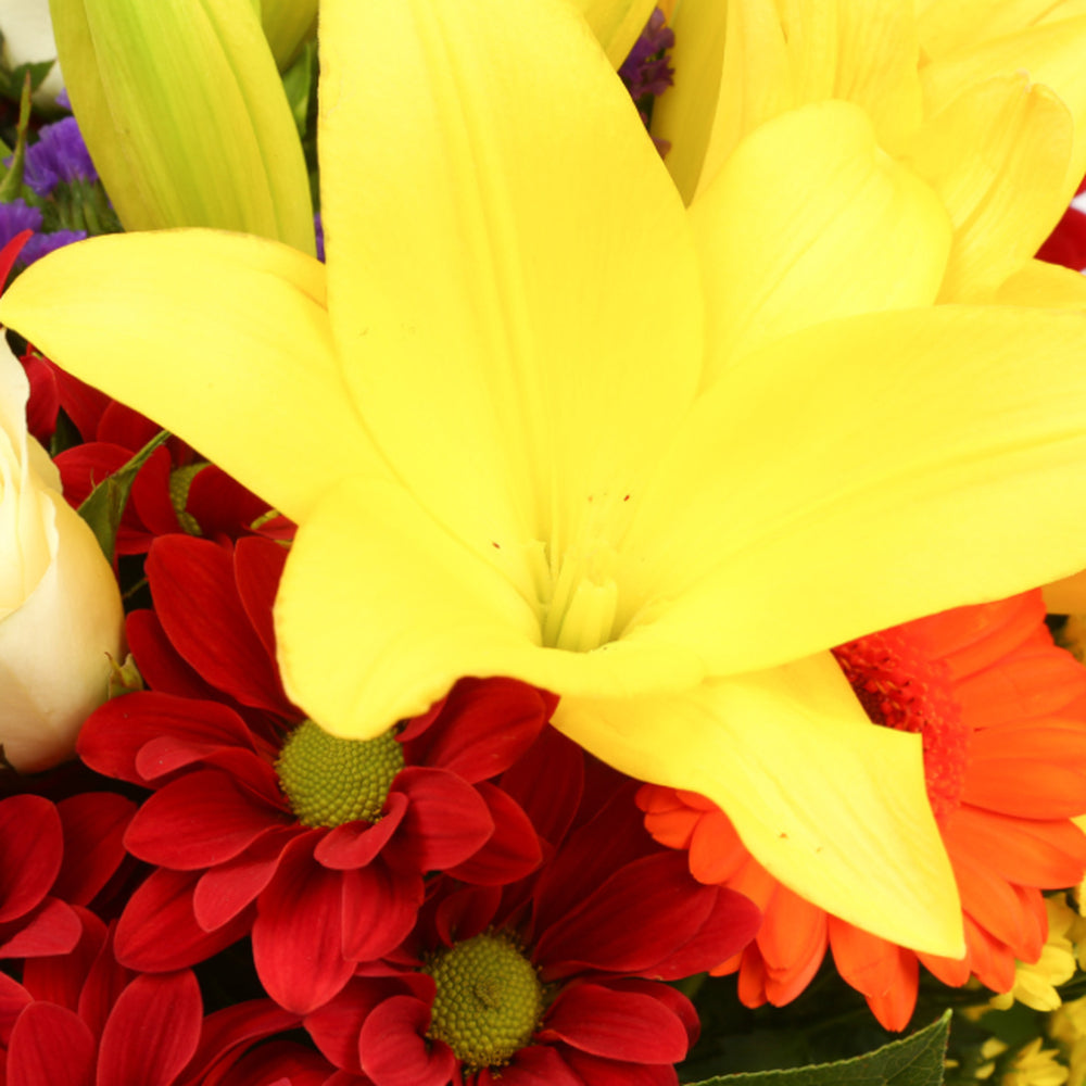 Congratulations Balloon & Sun Delight FlowersThis Beautiful Bouquet, carefully selected flowers with foliage are expertly arranged to create this dramatic design. This stunning gift is the ultimate gift to create an impression. Beautifully wrapped and tie