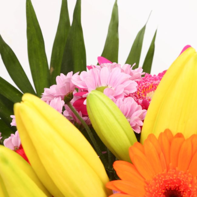 Summer Sun BouquetThis Beautiful Bouquet, carefully selected flowers with foliage are expertly arranged to create this dramatic design. This stunning gift is the ultimate gift to create an impression. Beautifully wrapped and tied with ribbon before being