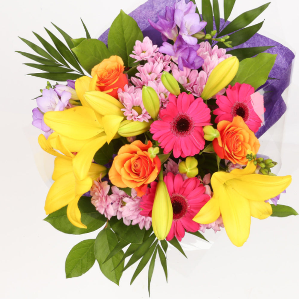 Embrace Flowers BouquetThis Beautiful Bouquet, carefully selected flowers with foliage are expertly arranged to create this dramatic design. This stunning gift is the ultimate gift to create an impression. Beautifully wrapped and tied with ribbon before b