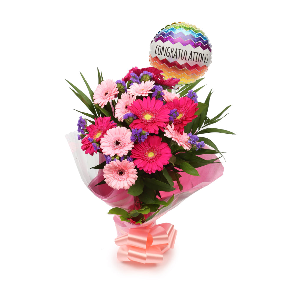 Congratulations Balloon & Gerbera Blush FlowersThis Beautiful Bouquet with Balloon, carefully selected flowers with foliage are expertly arranged to create this dramatic design. This stunning gift is the ultimate gift to create an impression. Beautifully