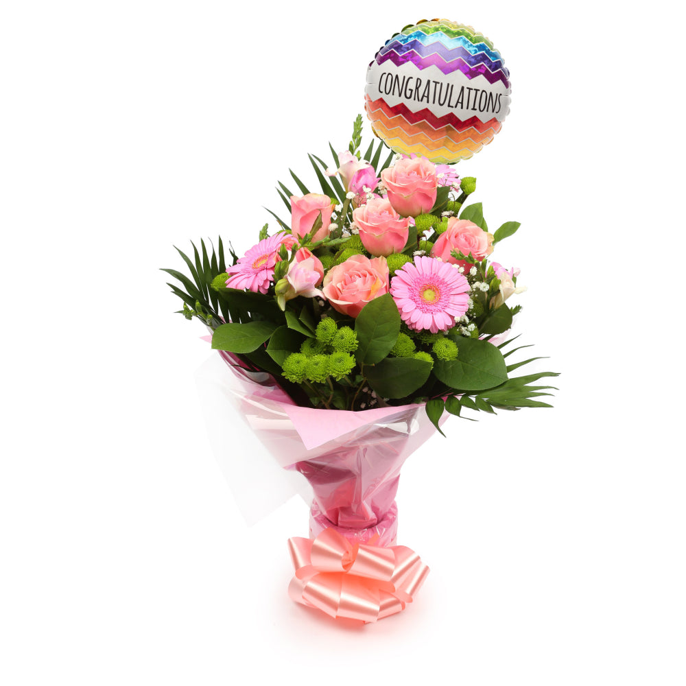 Congratulations Balloon & Cherished Pink FlowersThis Beautiful Bouquet, carefully selected flowers with foliage are expertly arranged to create this dramatic design. This stunning gift is the ultimate gift to create an impression. Beautifully wrapped and