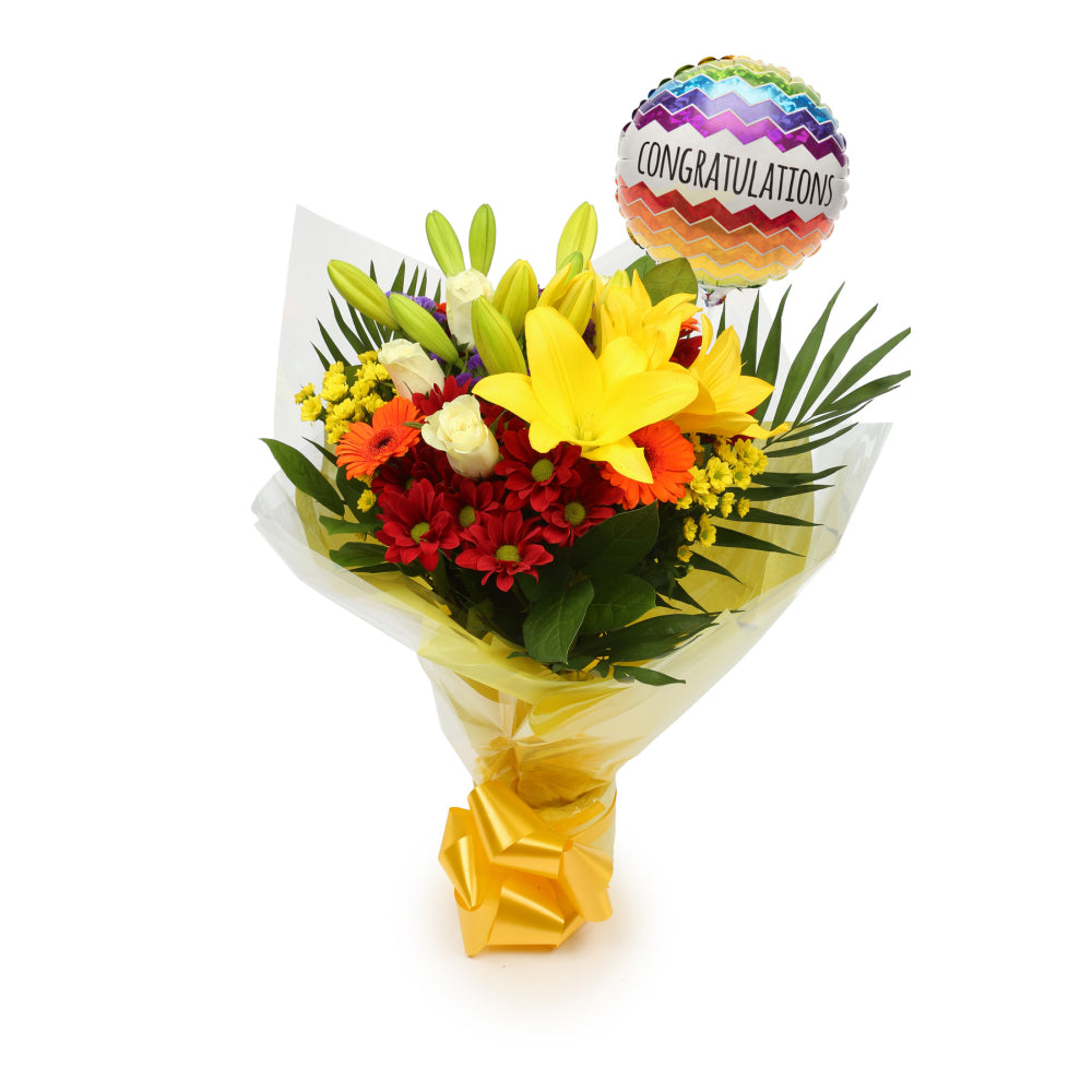 Congratulations Balloon & Sun Delight FlowersThis Beautiful Bouquet, carefully selected flowers with foliage are expertly arranged to create this dramatic design. This stunning gift is the ultimate gift to create an impression. Beautifully wrapped and tie