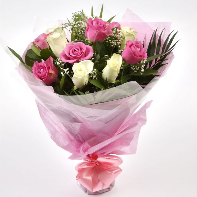 Pink & White RosesThis beautiful selection of fresh 12 Roses, in pretty Pink shades and in White, is a classic choice, ready to be displayed instantly. Beautifully wrapped and tied with ribbon before being delivered. Roses£14.99