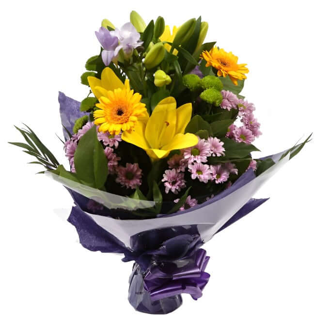 Scented Lilly & Freesias BouquetGreat Value with Scented Freesias Bouquet, Yellow Gerberas with foliage. A beautiful selection of , Yellow Lillies with Scented Freesias,are presented in a coordinating collar of tissue paper & cellophane with ribbon. The p