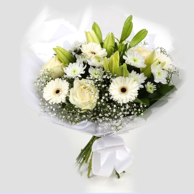 White Petite BouquetThis beautiful White bouquet says everything. a beautiful gift,this bouquet is made up of Roses,Chrsyanthemums, cream Germini, boom Chrysanthemums & Gypsophila. Beautifully wrapped and tied with ribbon before being delivered.£14.99
