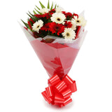 A Happy Gerbera Daisies BouquetHappy Gerbera Daisies Bouquet and foliage to create this beautifully scented bouquet. Beautifully wrapped and tied with ribbon before being delivered. A Beautiful Bouquet Hand Tied Flowers. Delivering Great Value Fresh Cut F