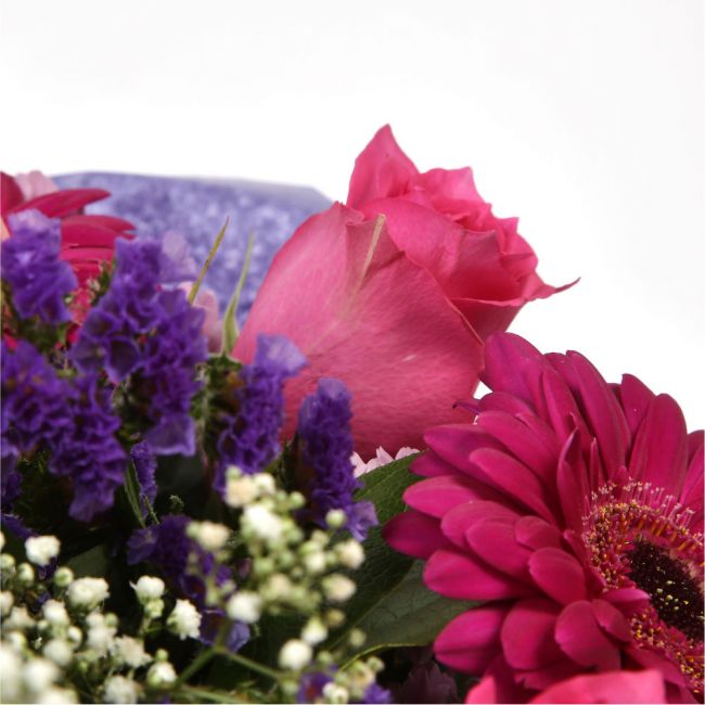 Beautiful Cerise Bouquet FlowersLarge-headed Roses combined with pretty Gerberas, Statice, Pink Gypsophila and foliage to create this beautifully scented bouquet. Each stem is expertly positioned by hand, hand crafted by one of our expert florists using t