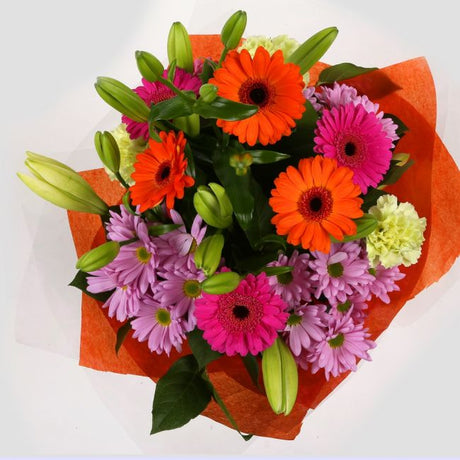 Birthday Balloon & Colour Burst Bouquet FlowersBirthday Balloon & Colour Burst Bouquet, Surprise a loved one with this gorgeous display of vibrant flowers, eye catching daisies, Yellow Lillies & Chrysanthemums, and Mint green Carnations.£19.99