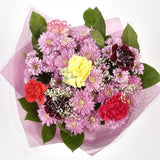 Confetti Special Bouquet FlowersThis bouquet of flowers is a sweet selection in shades of Pink, this bouquet is full of pretty pastel shades of spray and long stemmed carnations, gypsophilia and pink chrysanthemums. It's absolutely perfect. Beautifully wr