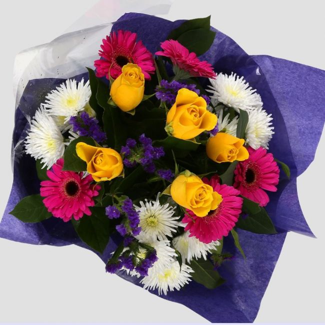 Starburst BouquetStarburst Blush Bouquet, Yellow Roses &Pink Gerberas and carefully selected flowers with foliage are expertly arranged to create this dramatic design. This stunning gift is the ultimate gift to create an impression. Beautifully wrapped an