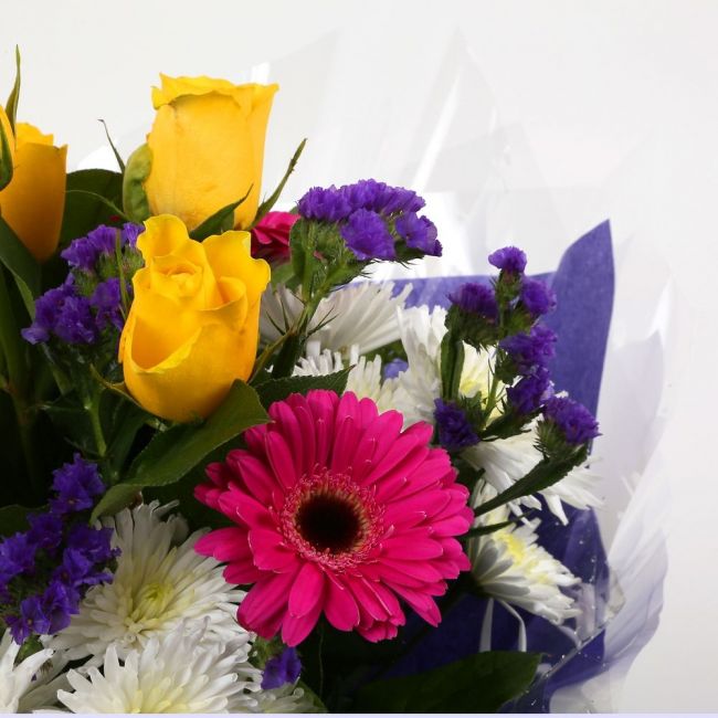 Starburst BouquetStarburst Blush Bouquet, Yellow Roses &Pink Gerberas and carefully selected flowers with foliage are expertly arranged to create this dramatic design. This stunning gift is the ultimate gift to create an impression. Beautifully wrapped an