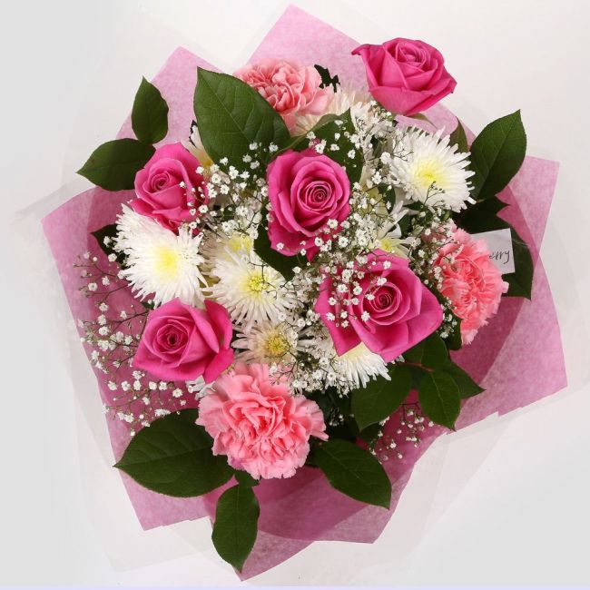 Strawberry PinkStrawberry Pink Blush Bouquet, Pink Roses & Gypsophila and carefully selected flowers with foliage are expertly arranged to create this dramatic design. This stunning gift is the ultimate gift to create an impression. Beautifully wrapped an
