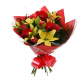 Emporium Flowers BouquetEmporium Bouquet Gerberas, Roses, Oriental Lilies and Palm foliage are expertly arranged to create this dramatic design. This stunning gift is the ultimate gift to create an impression. Beautifully wrapped and tied with ribbon befo