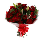 Red Rapture BouquetRed Rapture Bouquet Red Roses, Oriental Pink Lilies, Red Boom Carnations and Chrysanthemums with foliage are expertly arranged to create this dramatic design. This stunning gift is the ultimate gift to create an impression. Beautifully