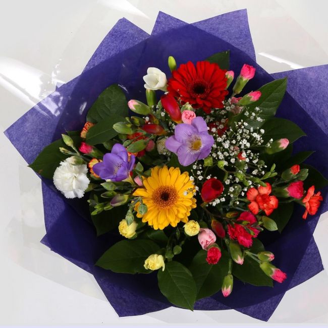 Fragrant Star Flowers BouquetFragrant Star Bouquet, This bouquet of flowers is a sweet selection , this bouquet is full of pretty pastel shades of spray and long stemmed carnations, gypsophilia, gerberas and Freesias. It's absolutely perfect. Beautifully