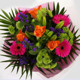 Melody Bright BouquetMelody Bright Bouquet, This bouquet of flowers is a sweet selection Cerise Germini, Oranage Roses, Yellow Lillies with Shamrock Chrysanthemums and Foliage.this bouquet is full of pretty shades . It's absolutely perfect. Beautifully wr