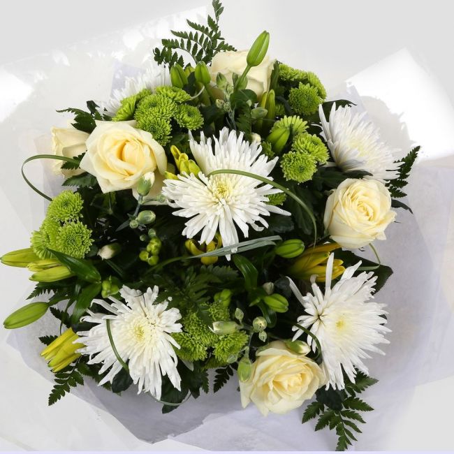 Golden Cream Flowers BouquetGolden Cream Bouquet, This lovely selection of flowers is the perfect gift for any occasion. White Boom chrysanthemums, White Cream Roses & Yellow Lillies with Shamrock flowers and assorted foliage are beautifully presented. Be
