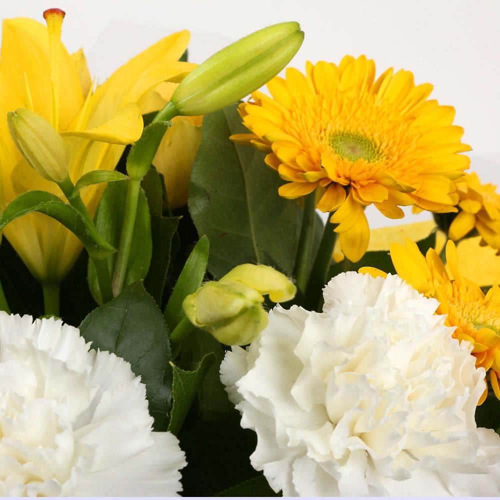 Birthday Balloon & Golden Sunshine FlowersBirthday Balloon & Golden Sunshine Bouquet, This lovely selection of flowers is the perfect gift for any occasion. White Dianthus, Yellow Roses & Yellow Lillies with assorted foliage are beautifully presented. Bea