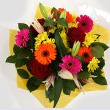 Congrats Balloon & Jubilation Bouquet FlowersCongratulations Balloon & Jubilation Bouquet. Make a striking impression by sending this stylish Jubilation Bouquet, hand-crafted by one of our expert florists using Lillies, Red Roses, Germini with Foliage Sur