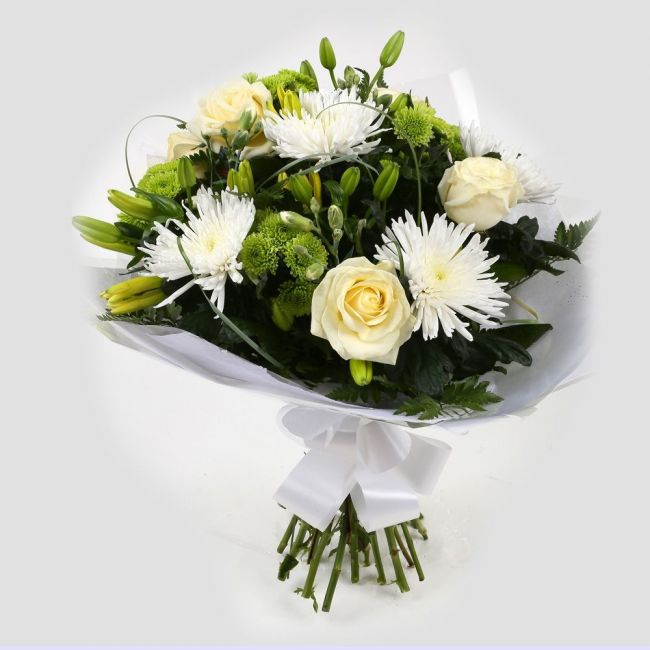 Golden Cream Flowers BouquetGolden Cream Bouquet, This lovely selection of flowers is the perfect gift for any occasion. White Boom chrysanthemums, White Cream Roses & Yellow Lillies with Shamrock flowers and assorted foliage are beautifully presented. Be