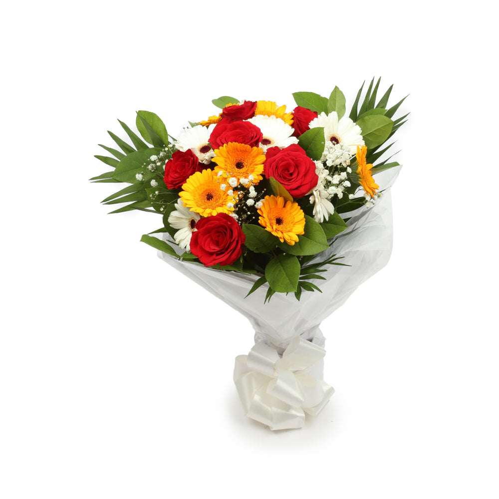 Celebration FlowersThis Beautiful Bouquet, carefully selected flowers with foliage are expertly arranged to create this dramatic design. This stunning gift is the ultimate gift to create an impression. Beautifully wrapped and tied with ribbon before being