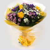 Charm Bouquet FlowersCharm Bouquet, This beautiful bouquet says everything. a beautiful gift,this bouquet is made up of Santini Chrsyanthemums, Yellow Roses, Statice with Foliage. Beautifully wrapped and tied with ribbon before being delivered.£14.99