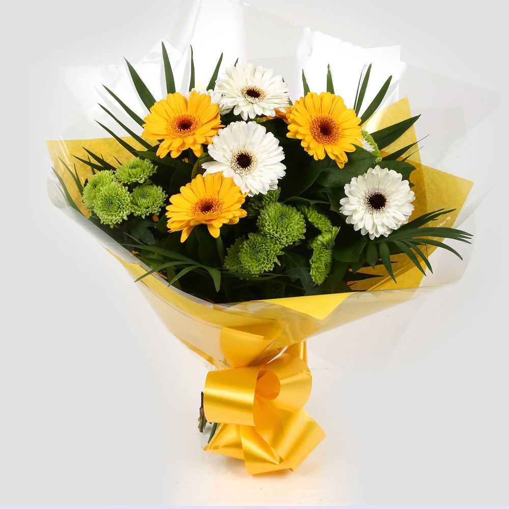 Birthday Balloon & Yellow Cream FlowersBirthday Balloon & Yellow Cream Bouquet mix of Chrysanthemum flowers in along with Yellow and White Germini all interspersed with delicate palm leaves. Beautifully wrapped and tied with ribbon before being delivered.