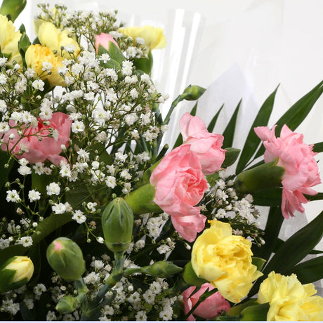 Birthday Balloon & Joyful FlowersBirthday Special With Birthday Balloon & Beautiful Joyful Bouquet,Spray Dianthus with Gypsophila and foliage, wrapped with matching ribbon. Beautifully wrapped and tied with ribbon before being delivered, stunning Bouquet