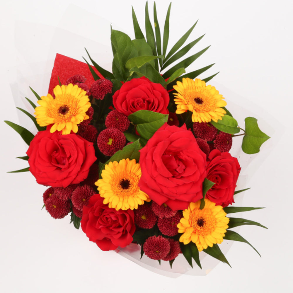 Birthday Balloon & Red Sun FlowersThis Beautiful Bouquet with Balloon, carefully selected flowers with foliage are expertly arranged to create this dramatic design. This stunning gift is the ultimate gift to create an impression. Beautifully wrapped and t