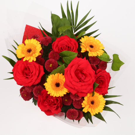 Congratulations Balloon & Red Sun FlowersThis Beautiful Bouquet with Balloon, carefully selected flowers with foliage are expertly arranged to create this dramatic design. This stunning gift is the ultimate gift to create an impression. Beautifully wrappe