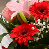 Birthday Balloon & Pink Red Deluxe FlowersThis Beautiful Bouquet, carefully selected flowers with foliage are expertly arranged to create this dramatic design. This stunning gift is the ultimate gift to create an impression. Beautifully wrapped and tied w