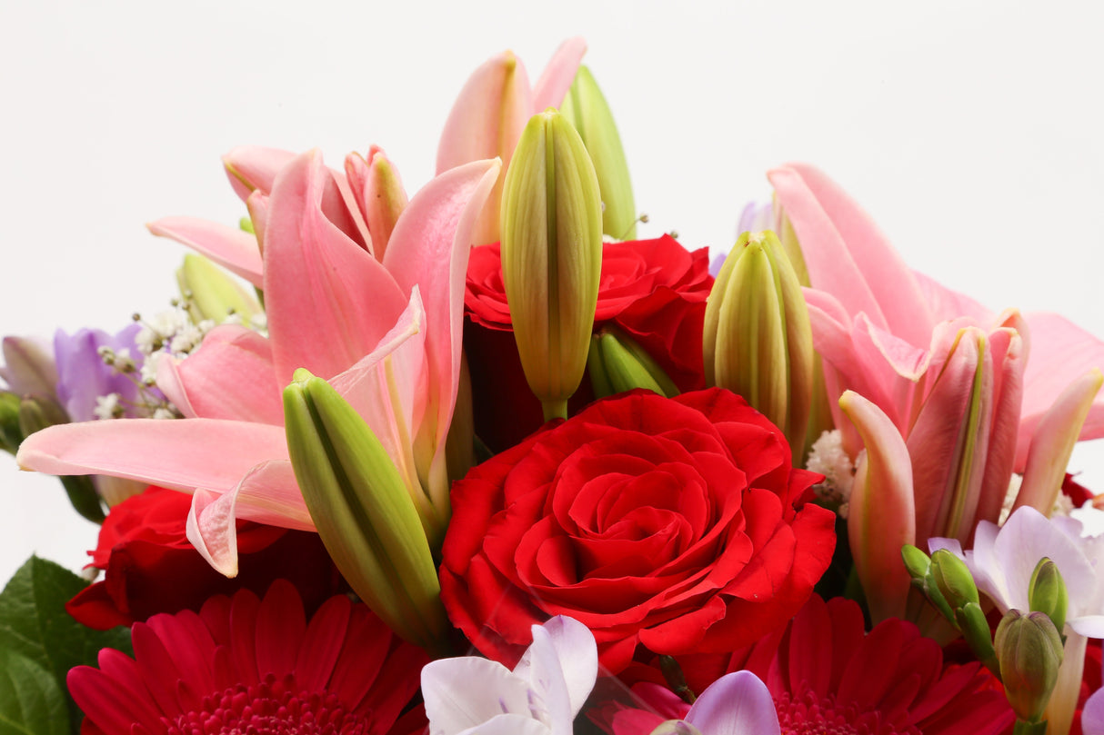 Birthday Balloon & Red & Pink Delight FlowersThis Beautiful Bouquet with Balloon , carefully selected flowers with foliage are expertly arranged to create this dramatic design. This stunning gift is the ultimate gift to create an impression. Beautifully w