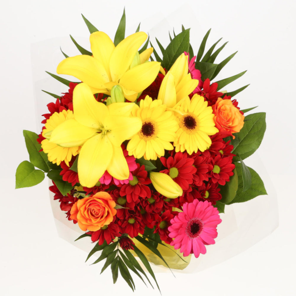 Birthday Balloon & Warm Sunset FlowersThis Beautiful Bouquet, carefully selected flowers with foliage are expertly arranged to create this dramatic design. This stunning gift is the ultimate gift to create an impression. Beautifully wrapped and tied with