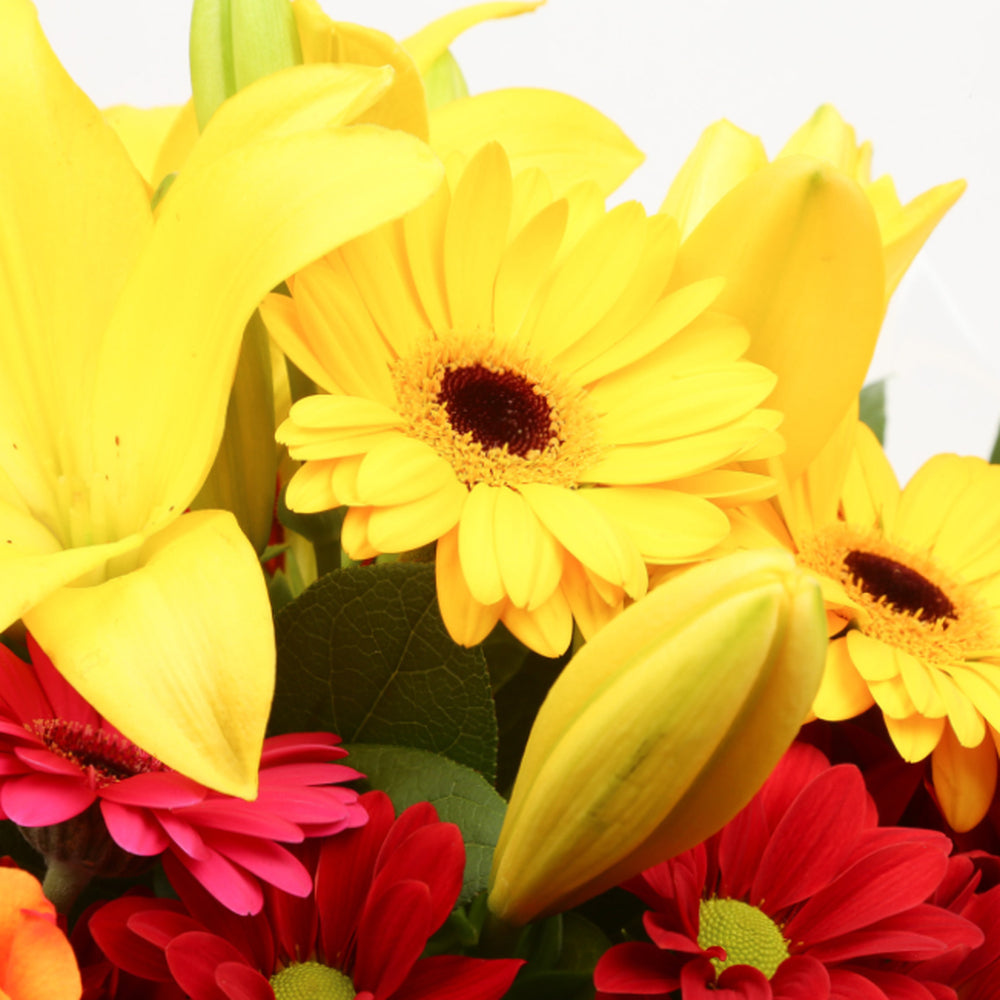 Congratulations Balloon & Warm Sunset FlowersThis Beautiful Bouquet, carefully selected flowers with foliage are expertly arranged to create this dramatic design. This stunning gift is the ultimate gift to create an impression. Beautifully wrapped and tie