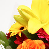 Congratulations Balloon & Warm Sunset FlowersThis Beautiful Bouquet, carefully selected flowers with foliage are expertly arranged to create this dramatic design. This stunning gift is the ultimate gift to create an impression. Beautifully wrapped and tie