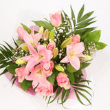 Birthday Balloon & Pink Jewel FlowersThis Beautiful Bouquet with Balloon, carefully selected flowers with foliage are expertly arranged to create this dramatic design. This stunning gift is the ultimate gift to create an impression. Beautifully wrapped an