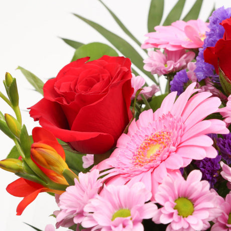 Congratulations Balloon & Red Blush FlowersThis Beautiful Bouquet with Balloon, carefully selected flowers with foliage are expertly arranged to create this dramatic design. This stunning gift is the ultimate gift to create an impression. Beautifully wrap