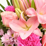 Birthday Balloon & Pink Candy FlowersThis Beautiful Bouquet with Balloon, carefully selected flowers with foliage are expertly arranged to create this dramatic design. This stunning gift is the ultimate gift to create an impression. Beautifully wrapped an