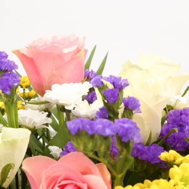 Sweet Floral BouquetThis Beautiful Bouquet, carefully selected flowers with foliage are expertly arranged to create this dramatic design. This stunning gift is the ultimate gift to create an impression. Beautifully wrapped and tied with ribbon before bein