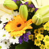 Sunshine Gold BouquetThis Beautiful Bouquet, carefully selected flowers with foliage are expertly arranged to create this dramatic design. This stunning gift is the ultimate gift to create an impression. Beautifully wrapped and tied with ribbon before bei