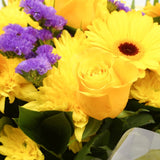 Yellow Star BouquetThis Beautiful Bouquet, carefully selected flowers with foliage are expertly arranged to create this dramatic design. This stunning gift is the ultimate gift to create an impression. Beautifully wrapped and tied with ribbon before being