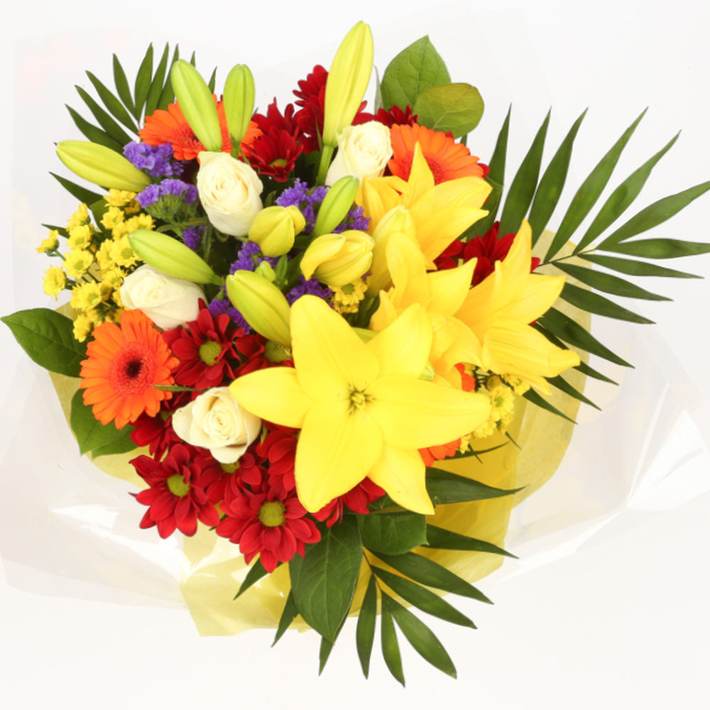 Congratulations Balloon & Sun Delight FlowersThis Beautiful Bouquet, carefully selected flowers with foliage are expertly arranged to create this dramatic design. This stunning gift is the ultimate gift to create an impression. Beautifully wrapped and tie